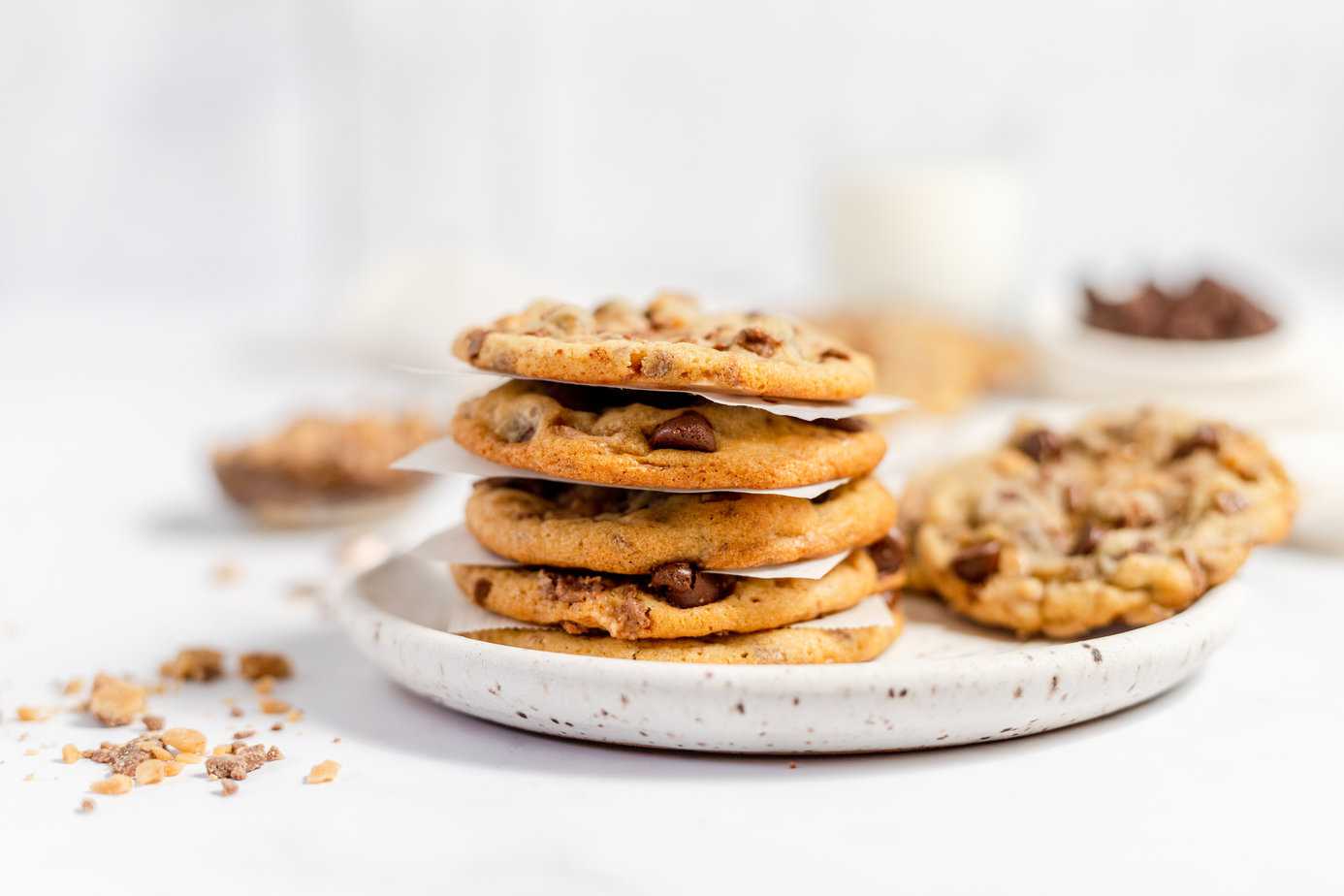 stack of toffee chocolate chip cookies on a plate